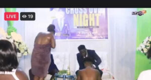 Pastor baths naked female church members during crossover service (VIDEO)